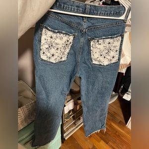 Custom denim back pocket design, hand stitched